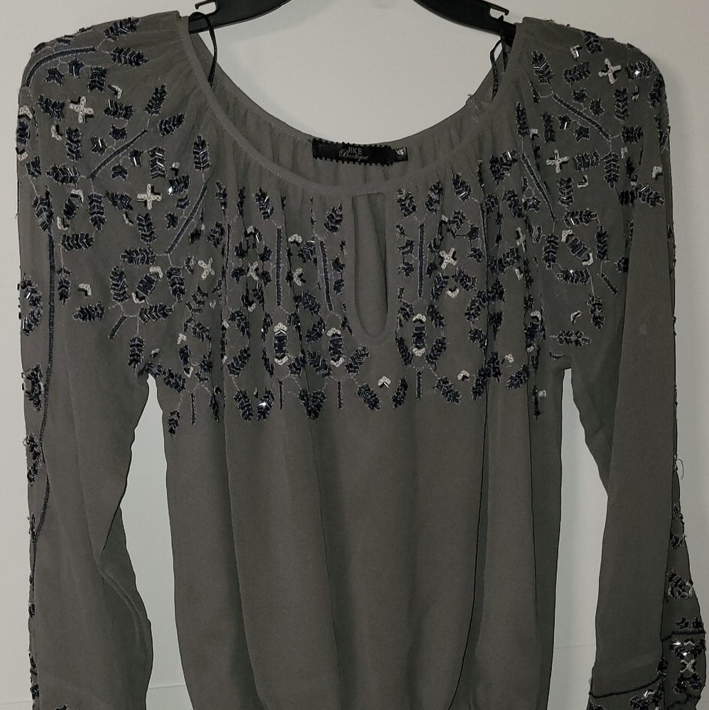 Beautiful sequined and stitch blouse